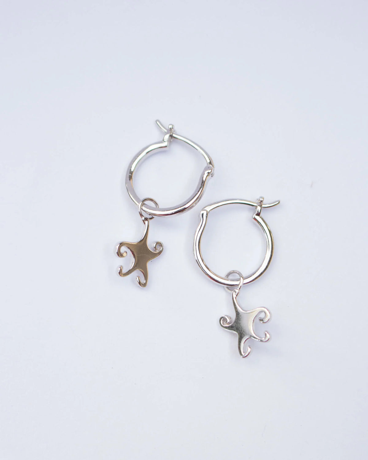 Jester Bloom Whimsical Star Hoops Sliver