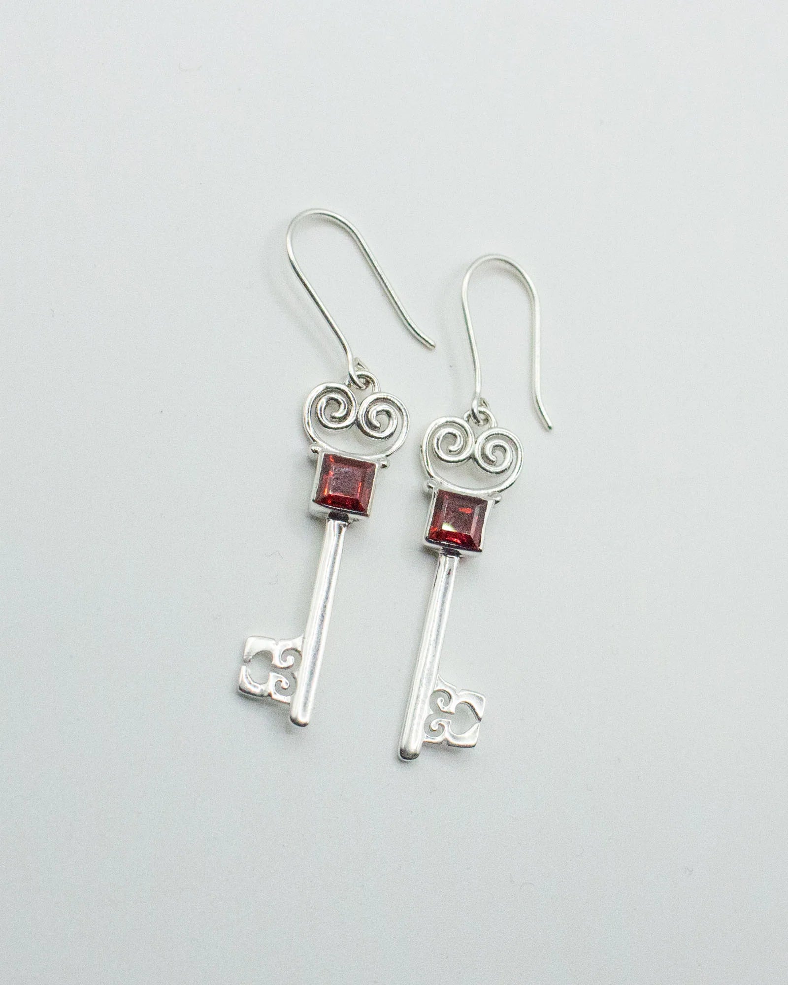 Jester Bloom Garnet Lovers Key Earrings