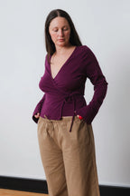 LONG SLEEVE WRAP TOP | AUBERGINE