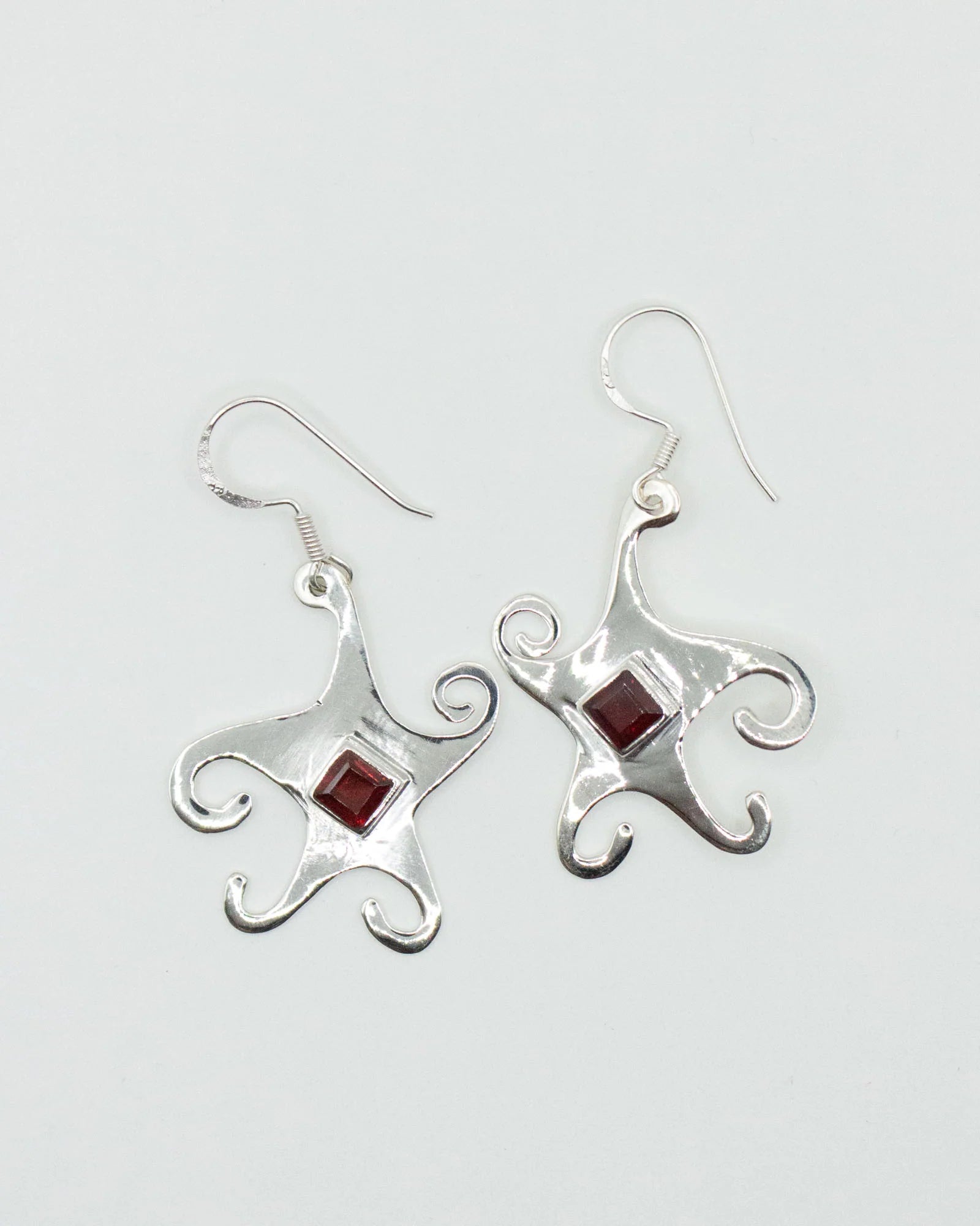 Jester Bloom Garnet Whimsical Star Earrings