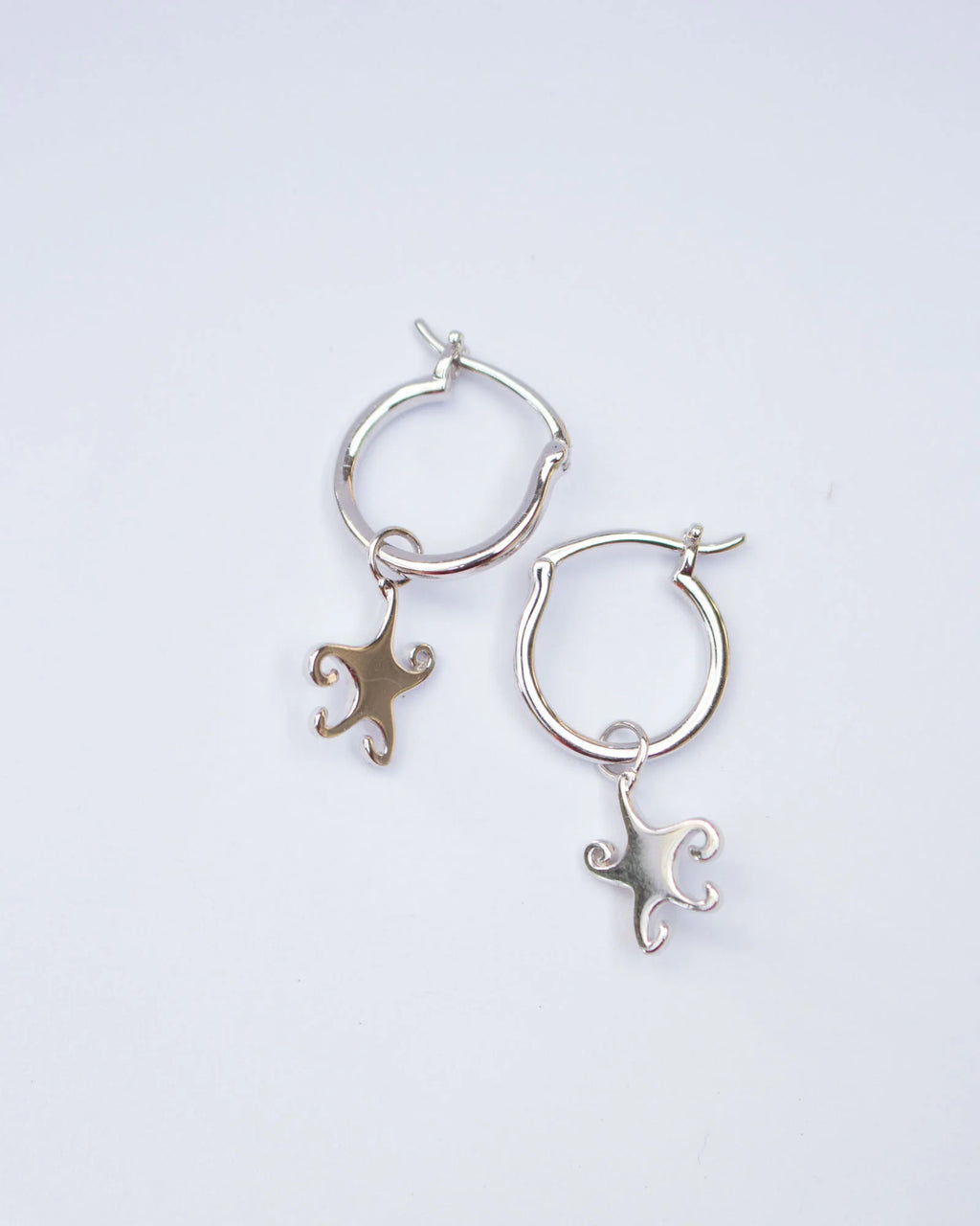 Jester Bloom Whimsical Star Hoops Sliver