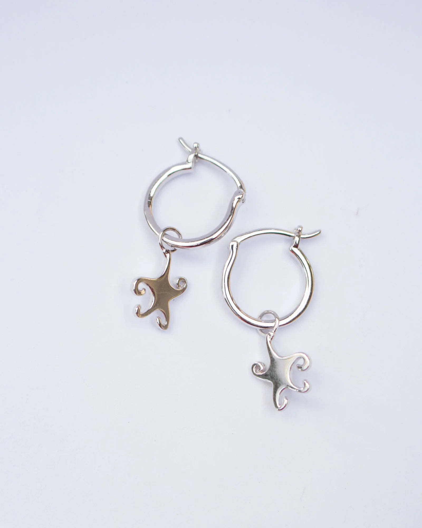 Jester Bloom Whimsical Star Hoops Sliver