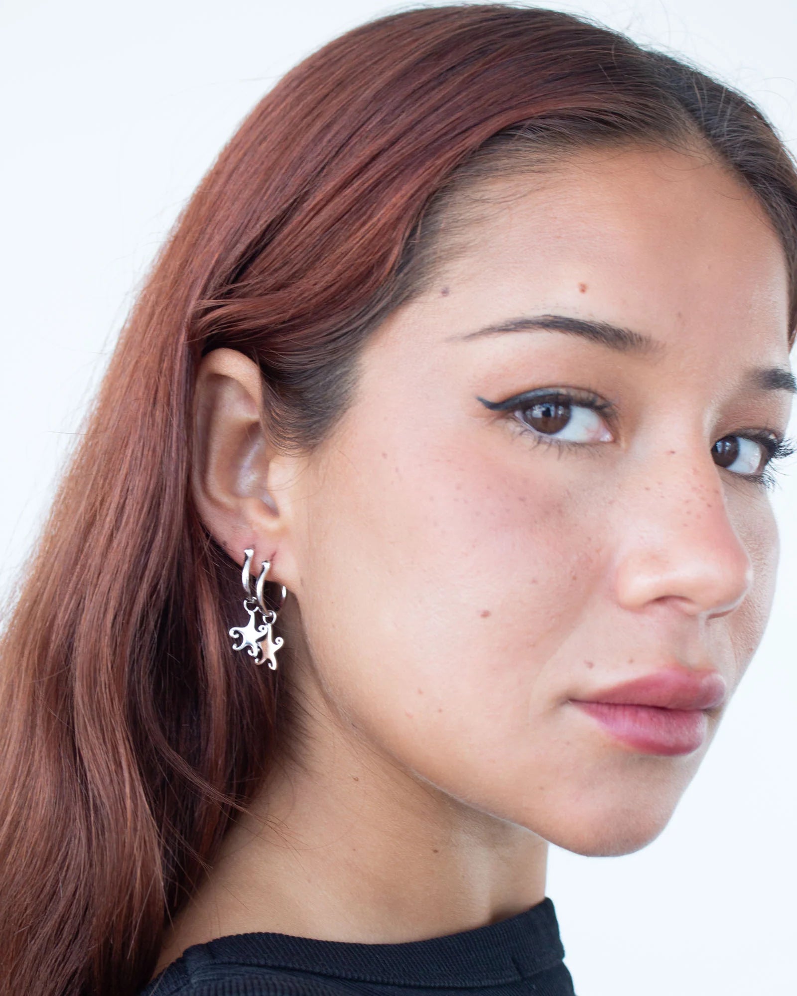 Jester Bloom Whimsical Star Hoops Sliver
